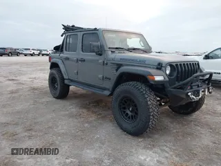2023 Jeep Wrangler Sport S z VIN 1C4HJXDG8PW594540, wystawiony jako IAAI lot #40551027 z przebiegiem 9 133 mil mil oraz . Historia ofert i sprzedaży dostępna na DreamBid. Obrazek 1.