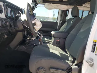 2024 Jeep Wrangler Sahara with VIN 1C4PJXEN7RW297948, listed as a Copart auction lot 54656795 with 12,292 mi miles and Salvage title. Bid and sale history available at DreamBid. Image 7.
