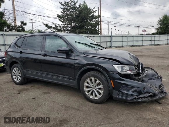 2018 Volkswagen Tiguan S with VIN 3VV0B7AX3JM055587, listed as a Copart auction lot 59751225 with 66,779 mi miles and Salvage title. Bid and sale history available at DreamBid. Image 4.