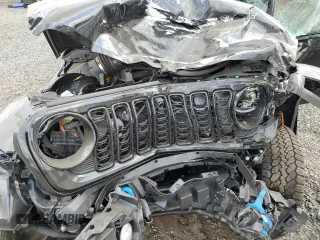 2024 Jeep Wrangler High Altitude z VIN 1C4RJXU62RW115897, wystawiony jako Copart lot #71614154 z przebiegiem 18 054 mil mil oraz Szkoda całkowita • Salvage title. Historia ofert i sprzedaży dostępna na DreamBid. Obrazek 14.