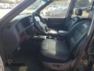 1998 Jeep Grand Cherokee Limited with VIN 1J4GZ78Y5WC170797, listed as a Copart auction lot 75227664 with 177,781 mi miles and Salvage Title. Bid and sale history available at carsss.com. Image 7.