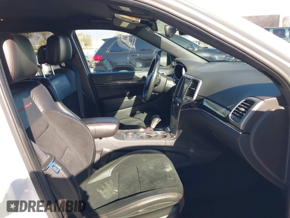 2017 Jeep Grand Cherokee Trailhawk with VIN 1C4RJFLGXHC959092, listed as a IAAI auction lot 41232281 with 108,659 mi miles and . Bid and sale history available at DreamBid. Image 5.