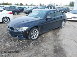 2016 BMW 4 Series 428i xDrive with VIN WBA4C9C52GG136584, listed as a IAAI auction lot 41530110 with 124,667 mi miles and . Bid and sale history available at carsss.com. Image 17.