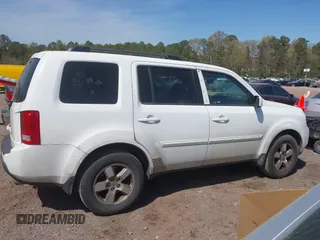 2011 Honda Pilot EX-L with VIN 5FNYF3H64BB027265, listed as a IAAI auction lot 41901424 with 198,556 mi miles and . Bid and sale history available at DreamBid. Image 13.