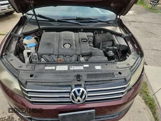 2013 Volkswagen Passat S with VIN 1VWAP7A30DC126376, listed as a Copart auction lot 65476255 with 144,933 mi miles and Clean title. Bid and sale history available at DreamBid. Image 7.