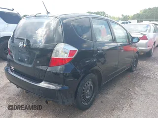 2009 Honda Fit with VIN JHMGE88249S053398, listed as a IAAI auction lot 42818376 with 242,218 mi miles and . Bid and sale history available at DreamBid. Image 4.