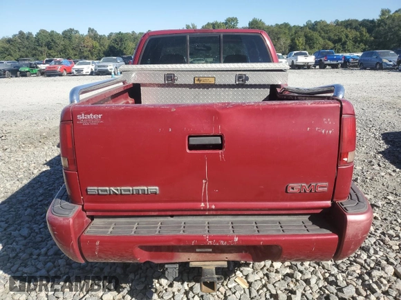 2003 GMC Sonoma SLS z VIN 1GTCS19X538152441, wystawiony jako Copart lot #75249904 z przebiegiem 100 250 mil mil oraz Szkoda całkowita • Salvage title. Historia ofert i sprzedaży dostępna na DreamBid. Obrazek 6.