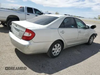 2003 Toyota Camry LE with VIN 4T1BE32K83U680622, listed as a Copart auction lot 54571165 with 166,790 mi miles and Salvage Title. Bid and sale history available at DreamBid. Image 3.