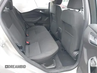 2016 Ford Focus SE z VIN 1FADP3F28GL300925, wystawiony jako IAAI lot #42563251 z przebiegiem 93 247 mil mil oraz . Historia ofert i sprzedaży dostępna na DreamBid. Obrazek 8.