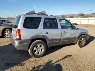 2001 Mazda Tribute LX with VIN 4F2CU08111KM20113, listed as a Copart auction lot 87681195 with 144,400 mi miles and Salvage Title. Bid and sale history available at DreamBid. Image 3.