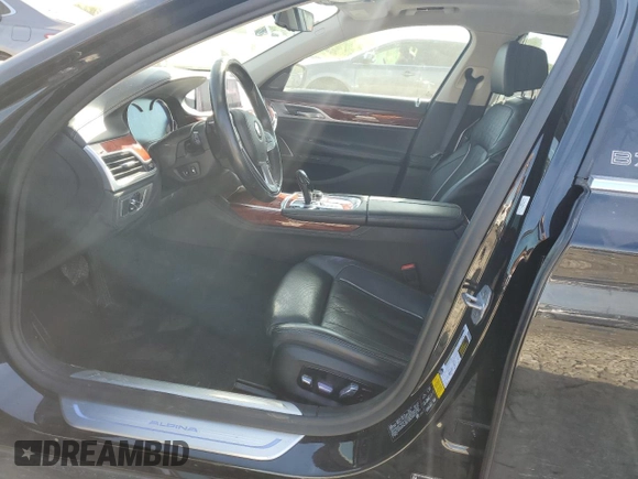 2019 BMW 7 Series with VIN WBA7F2C13KB242430, listed as a Copart auction lot 55525835 with 58,559 mi miles and Salvage title. Bid and sale history available at DreamBid. Image 7.