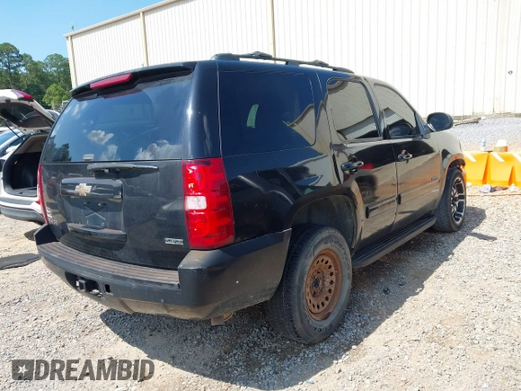 2011 Chevrolet Tahoe LS with VIN 1GNSCAE07BR278849, listed as a IAAI auction lot 42647528 with 194,920 mi miles and . Bid and sale history available at DreamBid. Image 4.
