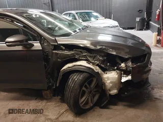 2018 Ford Fusion SE with VIN 3FA6P0HD5JR207844, listed as a IAAI auction lot 42534696 with 93,360 mi miles and . Bid and sale history available at DreamBid. Image 18.