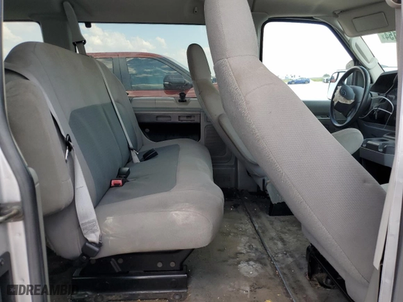 2014 Ford Econoline Wagon XL with VIN 1FBNE3BL0EDA47792, listed as a Copart auction lot 66011154 with 66,753 mi miles and Salvage Title. Bid and sale history available at carsss.com. Image 11.