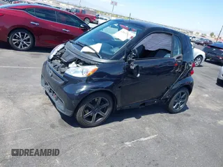 2015 Smart fortwo Passion z VIN WMEEJ3BA0FK812651, wystawiony jako IAAI lot #42063112 z przebiegiem 25 270 mil mil oraz . Historia ofert i sprzedaży dostępna na DreamBid. Obrazek 13.