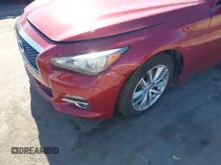 2015 Infiniti Q50 z VIN JN1BV7AR6FM420284, wystawiony jako IAAI lot #41795605 z przebiegiem 160 353 mil mil oraz . Historia ofert i sprzedaży dostępna na DreamBid. Obrazek 17.