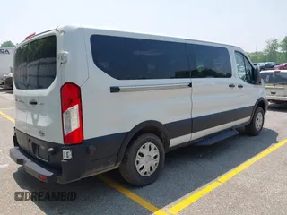 2019 Ford Transit Passenger XL z VIN 1FBZX2YM4KKB64966, wystawiony jako IAAI lot #42417498 z przebiegiem 157 311 mil mil oraz . Historia ofert i sprzedaży dostępna na DreamBid. Obrazek 4.