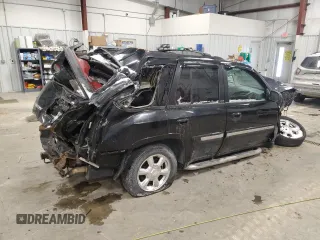 2003 GMC Envoy SLE with VIN 1GKDT13SX32206094, listed as a Copart auction lot 43734715 with 218,090 mi miles and Non Repairable. Bid and sale history available at carsss.com. Image 3.