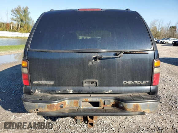 2004 Chevrolet Tahoe LS with VIN 1GNEK13T44J174219, listed as a Copart auction lot 74124674 with 235,172 mi miles and Salvage Title. Bid and sale history available at carsss.com. Image 6.