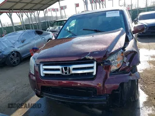 2007 Honda Pilot EX-L with VIN 5FNYF18647B004936, listed as a IAAI auction lot 41656465 with 225,580 mi miles and . Bid and sale history available at DreamBid. Image 13.