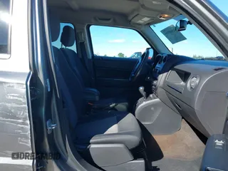 2014 Jeep Patriot Sport with VIN 1C4NJRBB5ED574390, listed as a IAAI auction lot 41949395 with 61,911 mi miles. Bid and sale history available at carsss.com. Image 5.