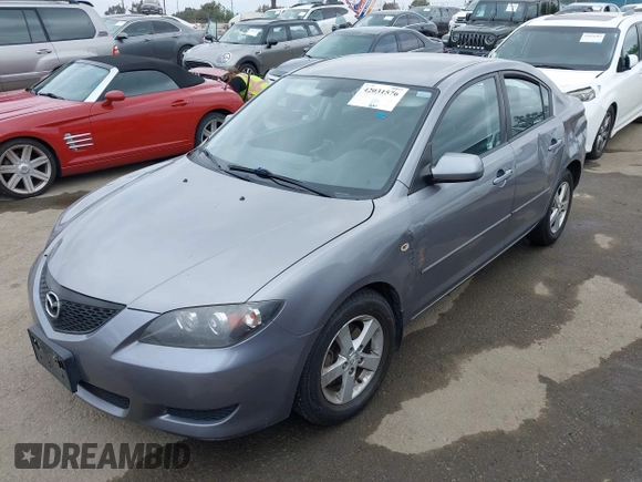 2006 Mazda 3 i with VIN JM1BK12F261420775, listed as a IAAI auction lot 42031576 with 145,530 mi miles. Bid and sale history available at carsss.com. Image 2.