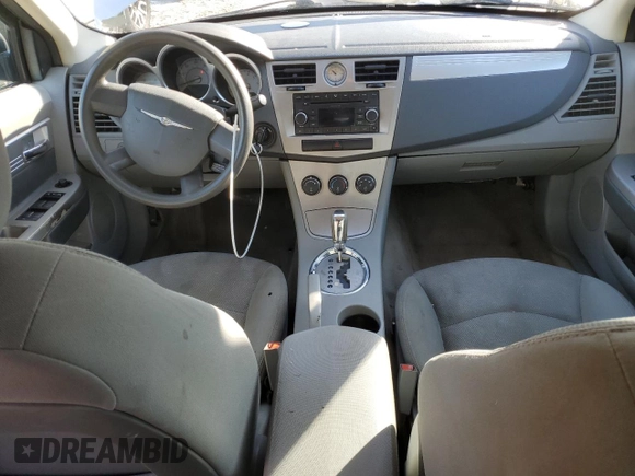 2007 Chrysler Sebring Touring z VIN 1C3LC56K07N669607, wystawiony jako Copart lot #87443504 z przebiegiem 204 179 mil mil oraz Szkoda całkowita • Salvage title. Historia ofert i sprzedaży dostępna na DreamBid. Obrazek 8.