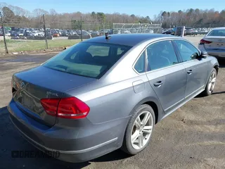 2014 Volkswagen Passat TDI SEL Premium with VIN 1VWCN7A30EC065191, listed as a IAAI auction lot 41860810 with 275,430 mi miles. Bid and sale history available at carsss.com. Image 4.