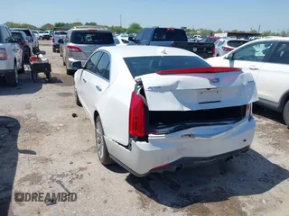 2018 Cadillac ATS Sedan RWD with VIN 1G6AA5RX8J0180654, listed as a IAAI auction lot 41853919 with 80,345 mi miles. Bid and sale history available at carsss.com. Image 3.