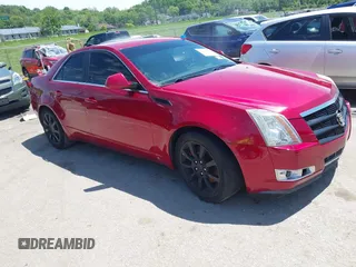 2008 Cadillac CTS RWD z VIN 1G6DR57V780133326, wystawiony jako IAAI lot #42184065 z przebiegiem 129 338 mil mil oraz . Historia ofert i sprzedaży dostępna na DreamBid. Obrazek 1.