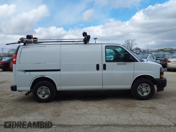 2018 Chevrolet Express Cargo Van with VIN 1GCWGAFP1J1322142, listed as a IAAI auction lot 41952498 with 155,218 mi miles. Bid and sale history available at carsss.com. Image 13.