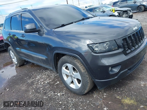 2011 Jeep Grand Cherokee Laredo with VIN 1J4RR4GG9BC723395, listed as a IAAI auction lot 42092022 with 86,226 mi miles and . Bid and sale history available at DreamBid. Image 1.