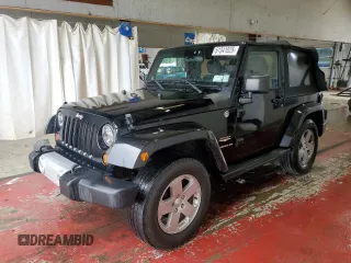 2011 Jeep Wrangler Sahara with VIN 1J4AA5D18BL606384, listed as a Copart auction lot 61341025 with 136,770 mi miles and Salvage title. Bid and sale history available at DreamBid. Image 1.