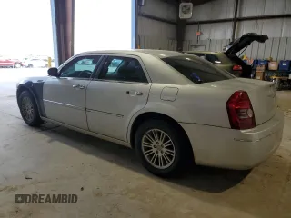 2010 Chrysler 300 Touring with VIN 2C3CA5CV8AH153855, listed as a Copart auction lot 49689075 with 223,059 mi miles and Salvage Title. Bid and sale history available at carsss.com. Image 2.