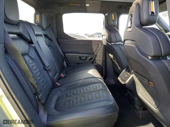 2023 Rivian R1T Adventure with VIN 7FCTGAAA5PN017311, listed as a Copart auction lot 42523755 with 35,039 mi miles and Salvage Title. Bid and sale history available at carsss.com. Image 11.