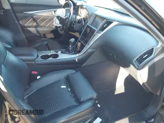 2014 Infiniti Q50 Hybrid Premium with VIN JN1AV7APXEM690577, listed as a IAAI auction lot 41493689 with 89,337 mi miles and . Bid and sale history available at DreamBid. Image 5.