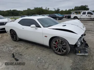 2014 Dodge Challenger SRT-8 z VIN 2C3CDYCJ1EH258264, wystawiony jako Copart lot #75100064 z przebiegiem 105 432 mil mil oraz Szkoda całkowita • Salvage title. Historia ofert i sprzedaży dostępna na DreamBid. Obrazek 4.