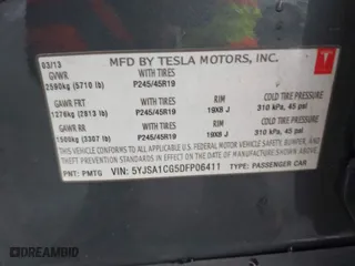 2013 Tesla Model S with VIN 5YJSA1CG5DFP06411, listed as a IAAI auction lot 41079914 with 266,968 mi miles. Bid and sale history available at carsss.com. Image 9.
