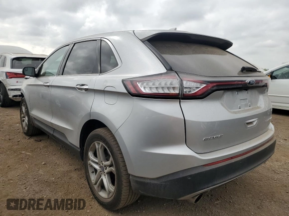 2015 Ford Edge Titanium z VIN 2FMTK4K9XFBB56155, wystawiony jako Copart lot #56735555 z przebiegiem 86 167 mil mil oraz Szkoda całkowita • Salvage title. Historia ofert i sprzedaży dostępna na DreamBid. Obrazek 2.