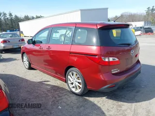 2012 Mazda 5 Grand Touring with VIN JM1CW2DL3C0144402, listed as a IAAI auction lot 41923524 with 150,584 mi miles and . Bid and sale history available at DreamBid. Image 3.