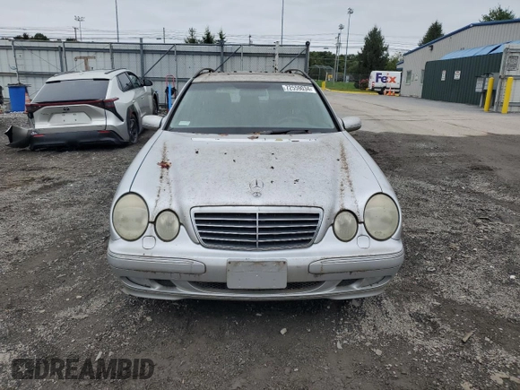 2000 Mercedes-Benz E-Class AWD with VIN WDBJH82J6YX039226, listed as a Copart auction lot 72559034 with 213,680 mi miles and Clean Title. Bid and sale history available at carsss.com. Image 5.