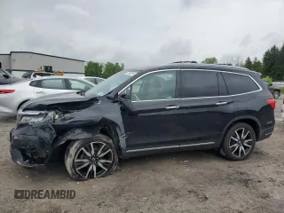 2020 Honda Pilot Touring 7-Passenger with VIN 5FNYF6H63LB058008, listed as a Copart auction lot 57982815 with 98,751 mi miles and Salvage title. Bid and sale history available at DreamBid. Image 1.