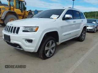 2016 Jeep Grand Cherokee Overland with VIN 1C4RJFCG2GC490420, listed as a IAAI auction lot 42200700 with 97,007 mi miles and . Bid and sale history available at DreamBid. Image 2.