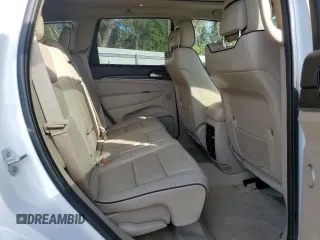 2019 Jeep Grand Cherokee Overland with VIN 1C4RJFCT2KC834690, listed as a Copart auction lot 84303144 with 63,053 mi miles and Salvage Title. Bid and sale history available at carsss.com. Image 11.
