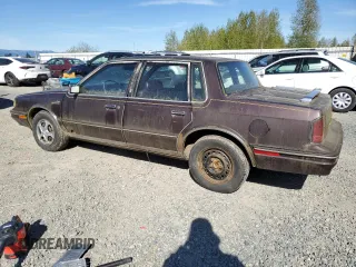 1987 Oldsmobile Cutlass Ciera with VIN 2G3AM51RXH9391582, listed as a Copart auction lot 53736795 with 81,728 mi miles and Clean Title. Bid and sale history available at DreamBid. Image 2.