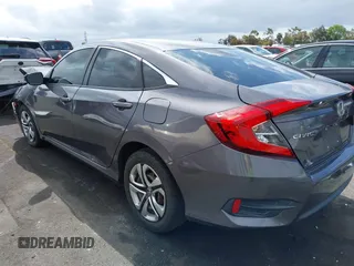 2018 Honda Civic LX with VIN 2HGFC2F58JH514161, listed as a IAAI auction lot 42073133 with 117,658 mi miles. Bid and sale history available at carsss.com. Image 3.