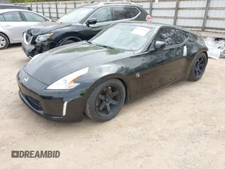2016 Nissan 370Z with VIN JN1AZ4EHXGM935774, listed as a IAAI auction lot 41976743 with 66,979 mi miles. Bid and sale history available at carsss.com. Image 17.