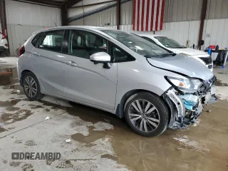 2015 Honda Fit EX-L with VIN 3HGGK5H87FM737610, listed as a Copart auction lot 62466515 with 103,454 mi miles and Salvage title. Bid and sale history available at DreamBid. Image 4.