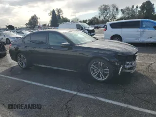 2017 BMW 7 Series 740i with VIN WBA7E2C59HG739693, listed as a Copart auction lot 42599835 with 90,061 mi miles and Salvage Title. Bid and sale history available at carsss.com. Image 4.