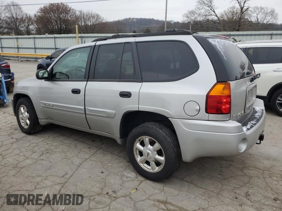 2005 GMC Envoy SLT with VIN 1GKDS13S452258553, listed as a Copart auction lot 82888944 with 174,546 mi miles and Salvage Title. Bid and sale history available at carsss.com. Image 2.